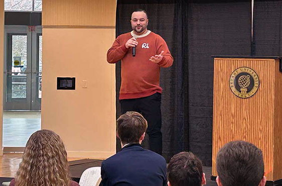 Social entrepreneur and community leader Ed Brady ’06 offers advice to attendees at the 2024 Bryant University Entrepreneurship Conference.